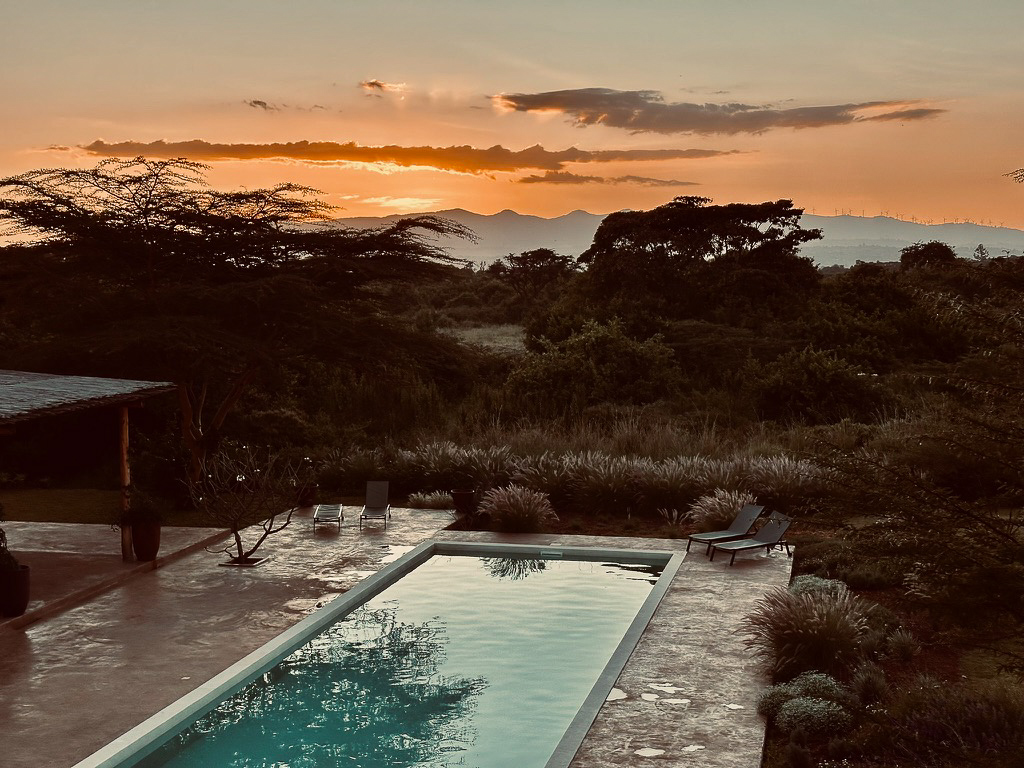 Sunset over the pool with the Ngong Hills